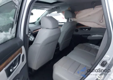 2018 Honda Cr-V Touring z USA, uszkodzony, nr VIN 7FARW2H95JE042773